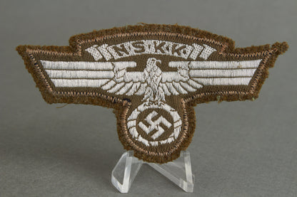 NSKK "Ärmeladler" For the "Braunhemd". With RZM Paper tag. Original.