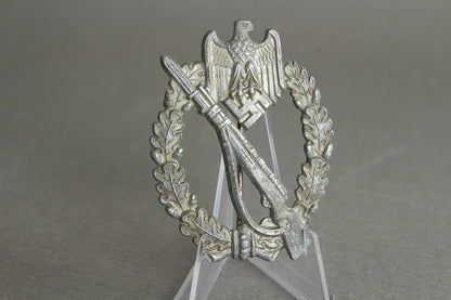 Infanterie Sturmabzeichen in silver. "Halb Hohl". Unmarked Steinhauer & Lück. Rare. Original.